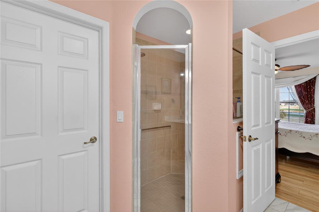 12384 Southeast 176th Loop Summerfield, FL 34491 - Photo 23 of 30 a view of a bathroom from a hallway
