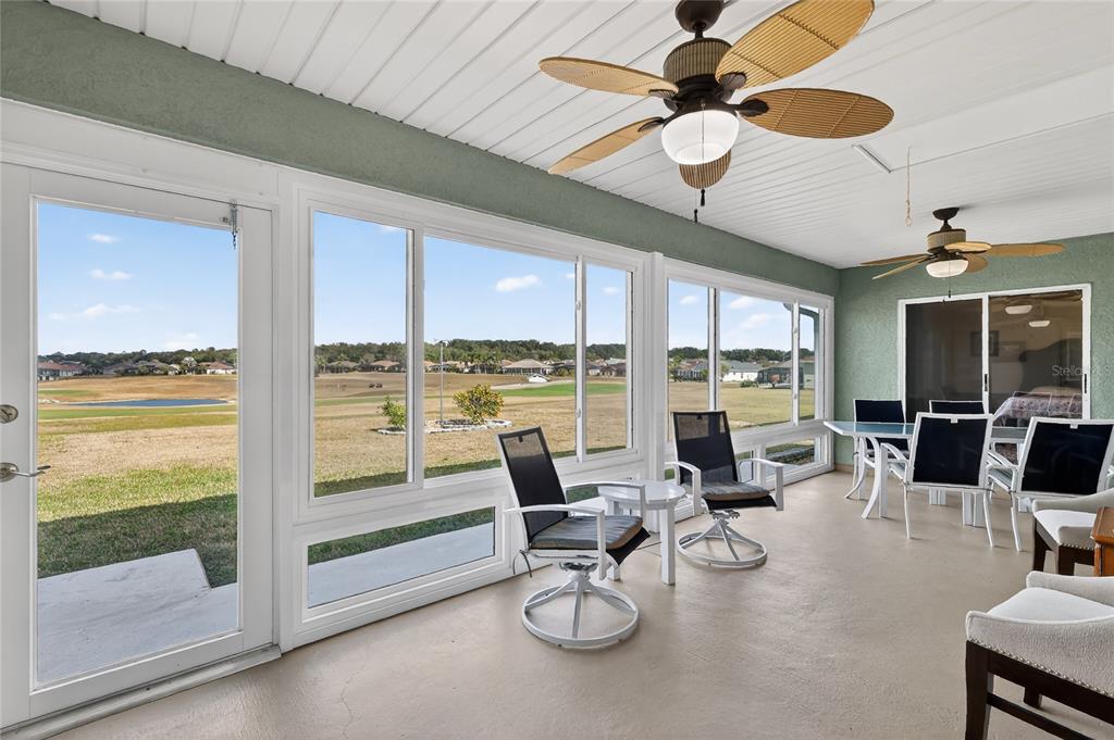 12384 Southeast 176th Loop Summerfield, FL 34491 - Photo 29 of 30 a very nice looking living room with a large window with white walls and furniture