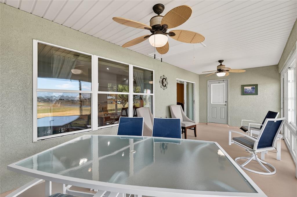 12384 Southeast 176th Loop Summerfield, FL 34491 - Photo 30 of 30 a view of livingroom with furniture wooden floor and a ceiling fan