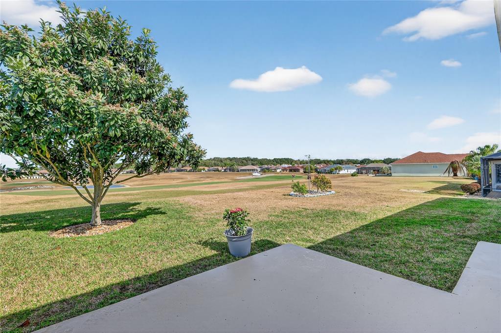 12384 Southeast 176th Loop Summerfield, FL 34491 - Photo 6 of 30 a view of a lake with a big yard