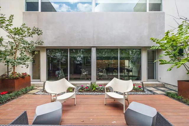 a building outdoor space with patio furniture