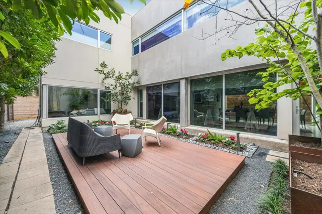 a room with furniture and garden view