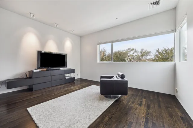 a bathroom with a bathtub and a sink