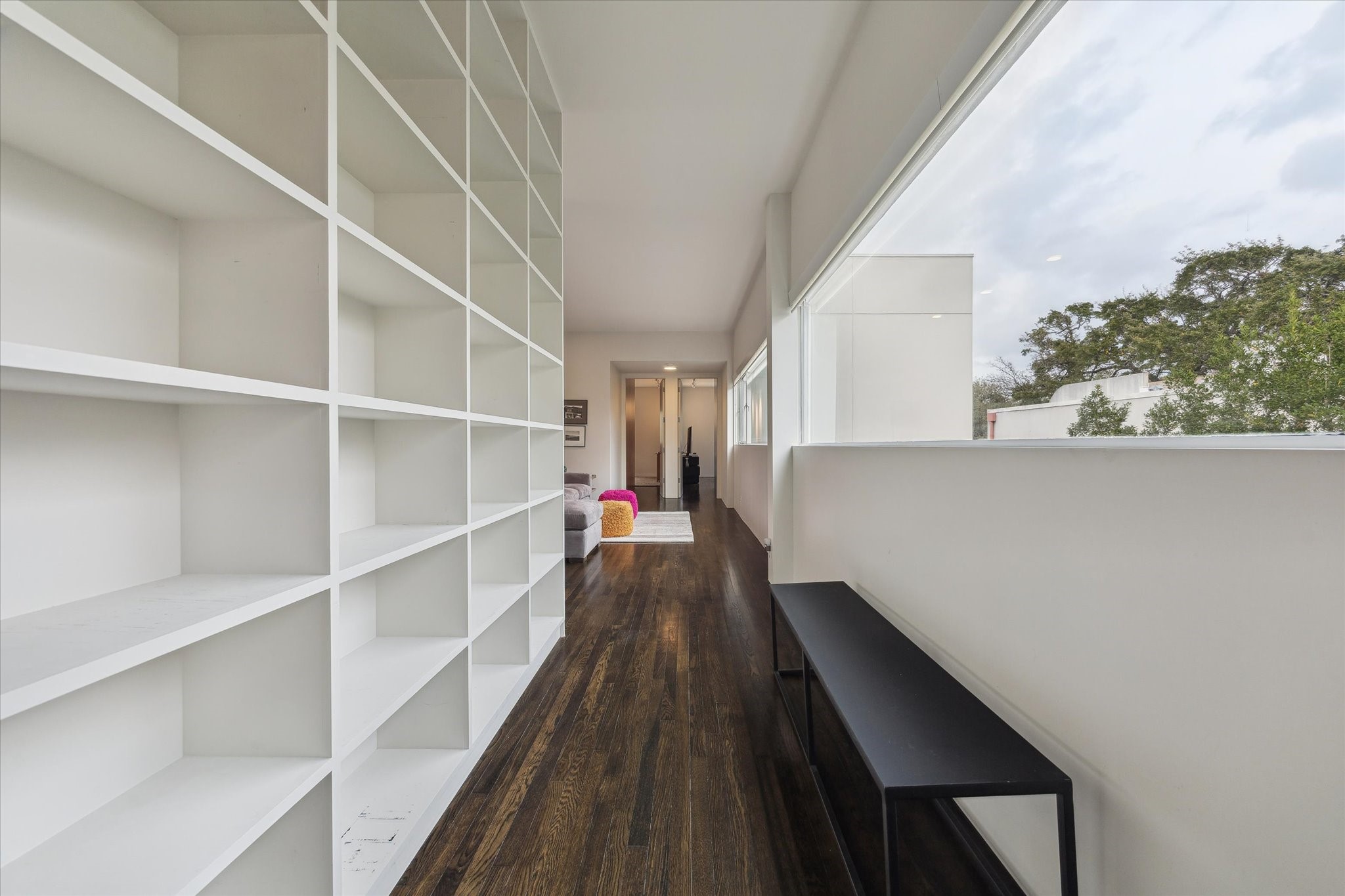 2307 Wroxton Road Houston, TX 77005 - Photo 27 of 35 a view of a hallway with wooden floor and entryway