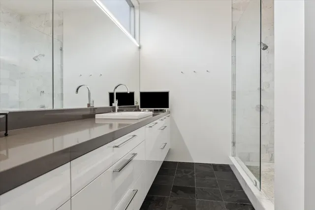 a stove top oven sitting inside of a kitchen
