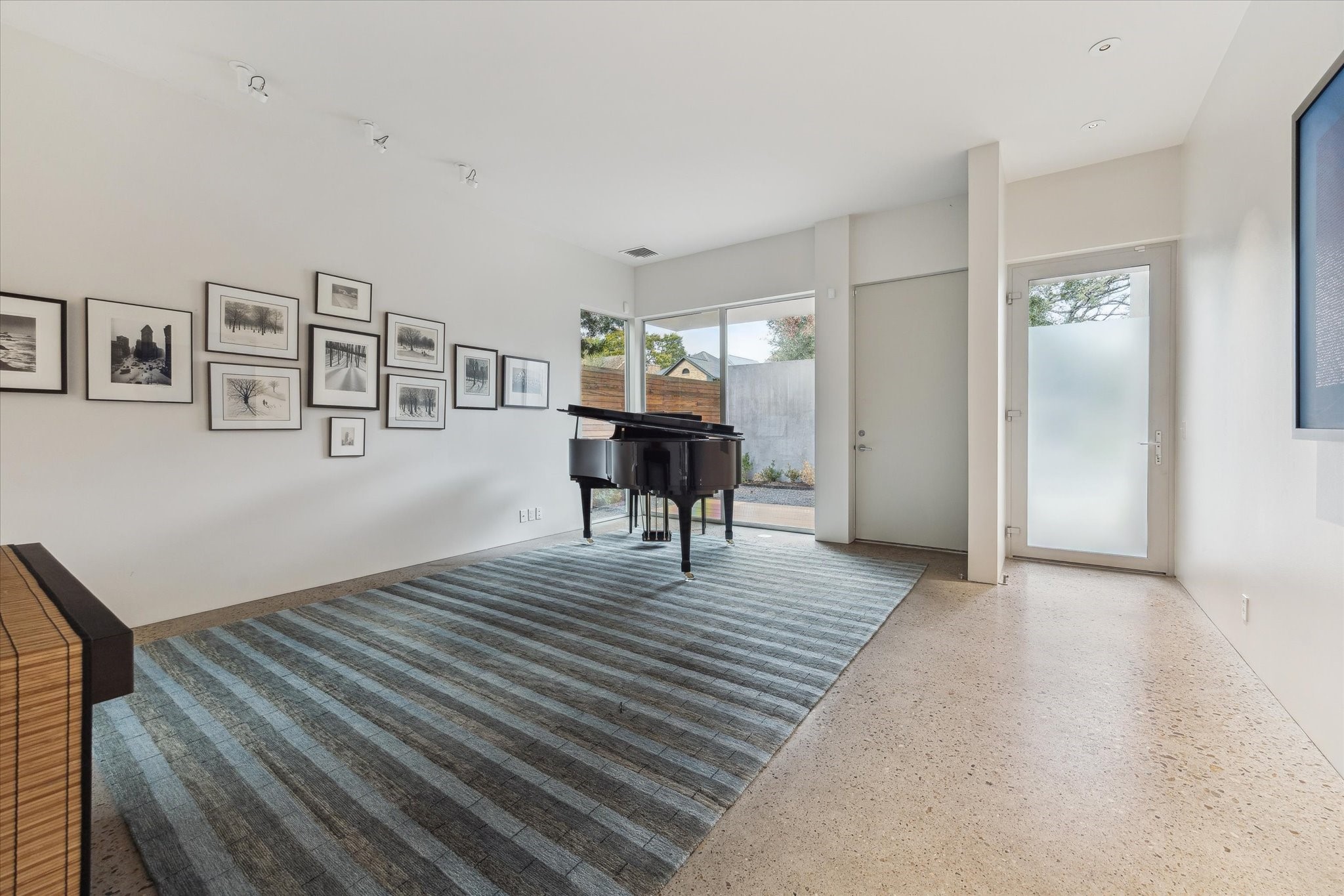2307 Wroxton Road Houston, TX 77005 - Photo 5 of 35 a view of a livingroom with furniture and wooden floor