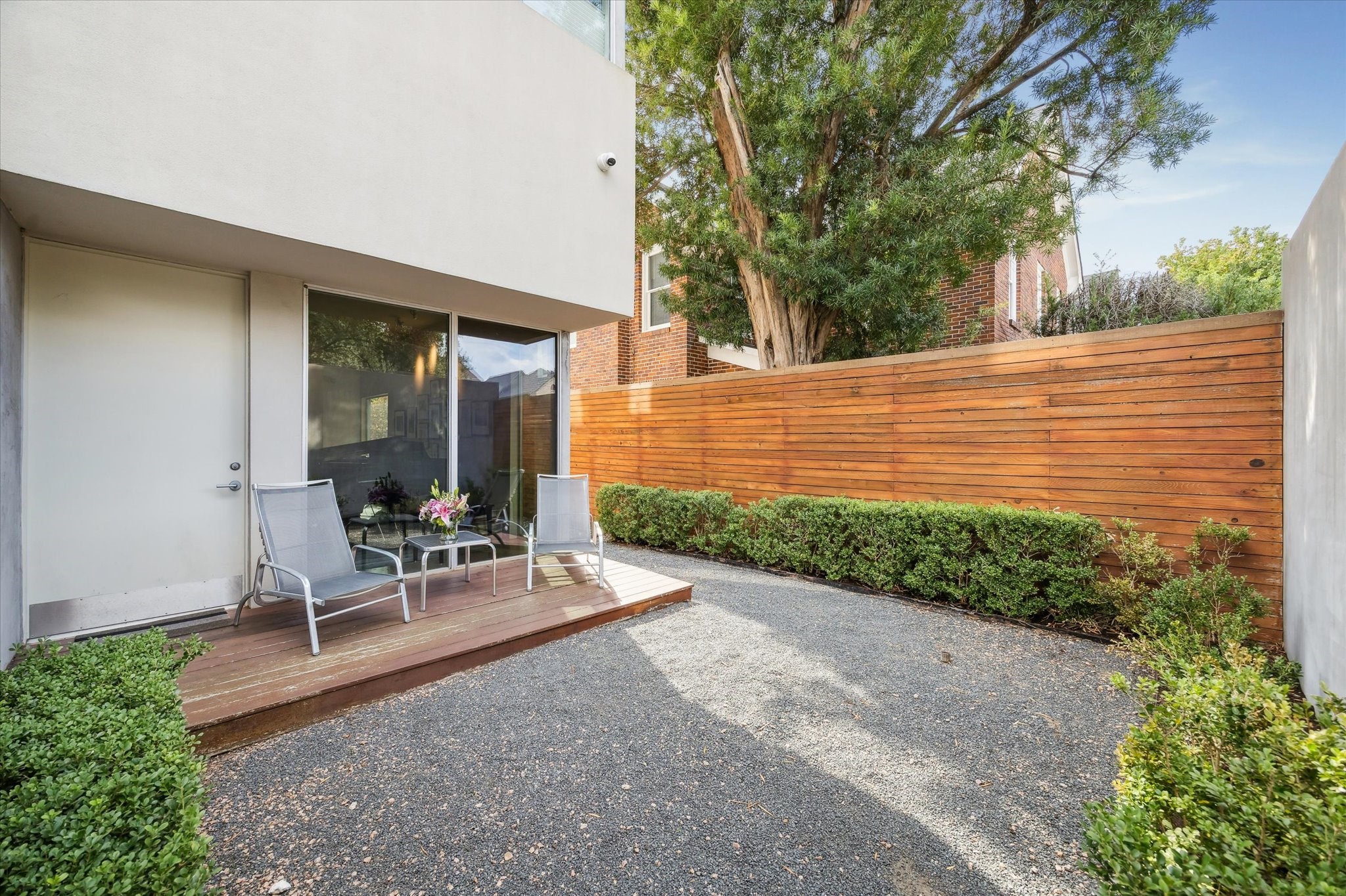 2307 Wroxton Road Houston, TX 77005 - Photo 7 of 35 a view of a backyard with sitting area