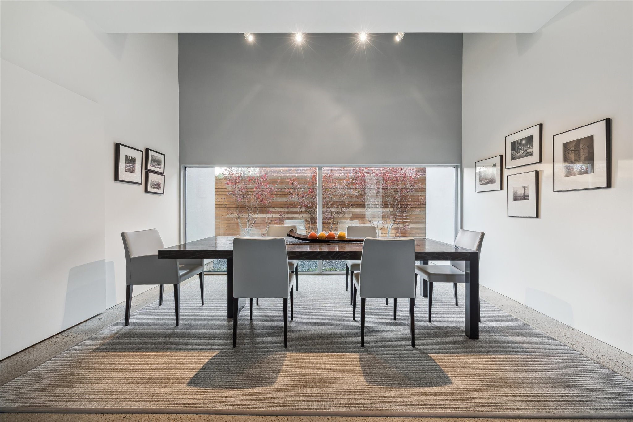 2307 Wroxton Road Houston, TX 77005 - Photo 10 of 35 a view of a dining room with furniture and window