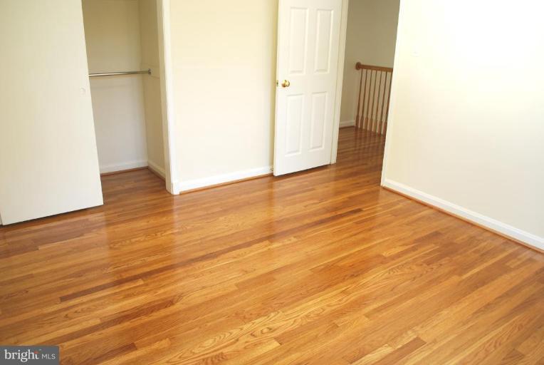 3517 Olympic Street Silver Spring, MD 20906 - Photo 11 of 30 a view of a room with wooden floor