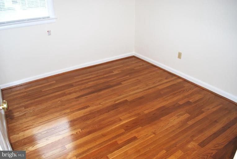 3517 Olympic Street Silver Spring, MD 20906 - Photo 14 of 30 a view of empty room with wooden floor