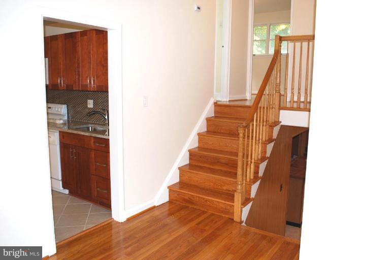 3517 Olympic Street Silver Spring, MD 20906 - Photo 17 of 30 a view of entryway and hall with wooden floor