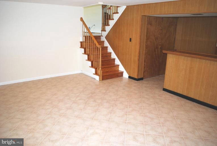 3517 Olympic Street Silver Spring, MD 20906 - Photo 22 of 30 a view of entryway with wooden floor
