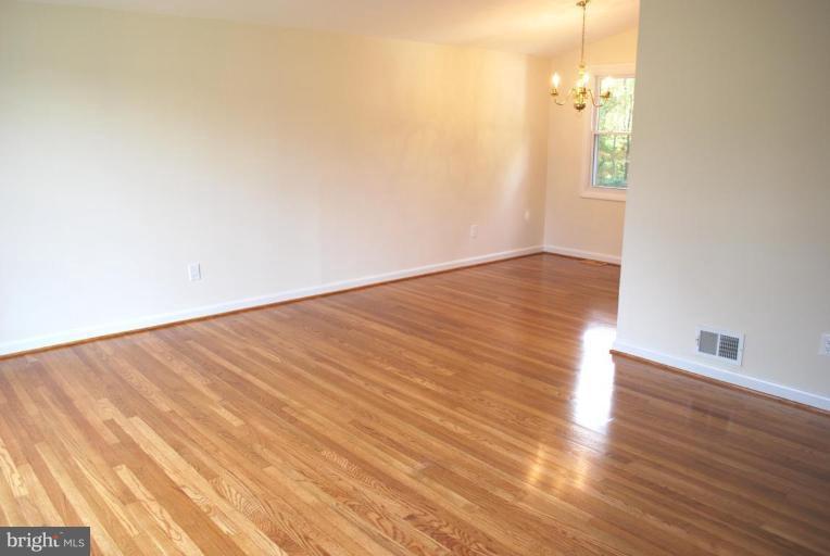 3517 Olympic Street Silver Spring, MD 20906 - Photo 5 of 30 wooden floor in a empty room