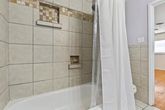 a bathroom with a bathtub