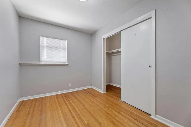 a view of an empty room and entryway