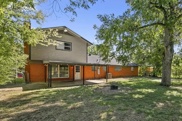 front view of a house with a big yard