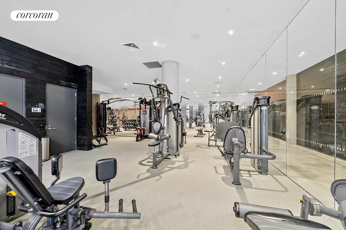 54 Noll Street, Unit 565 Brooklyn, NY 11206 - Photo 17 of 26 a view of a room with gym equipment