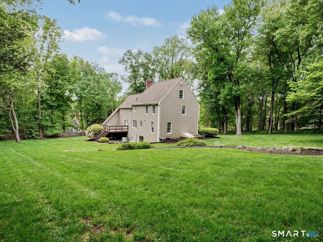 86 Fire Hill Road Redding, CT 06896 - Photo 32 of 36 a view of a house with backyard and garden