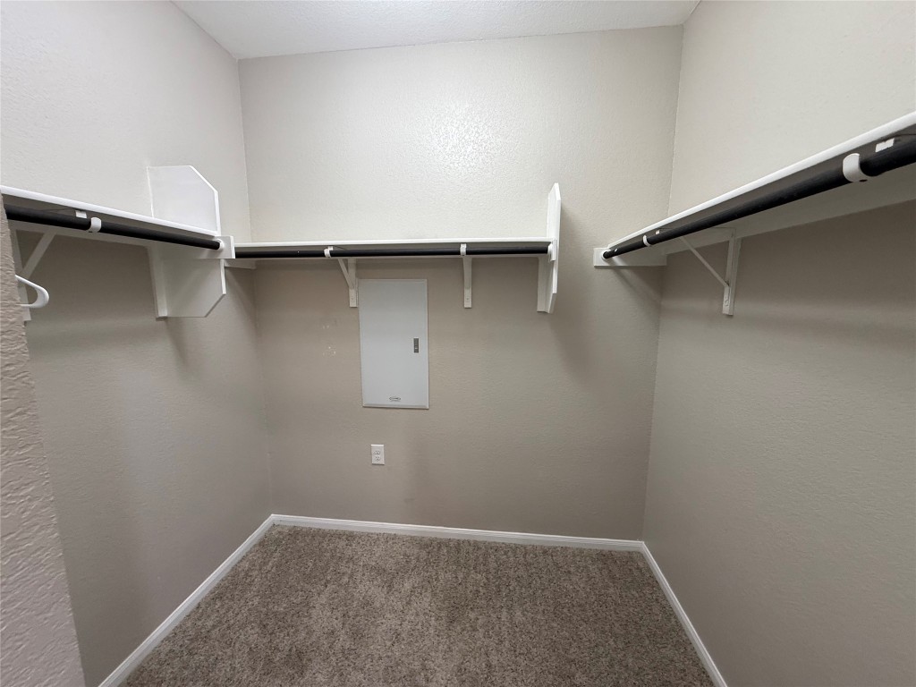 305 Rusk Bluff Avenue Leander, TX 78641 - Photo 26 of 34 a view of an empty walk in closet