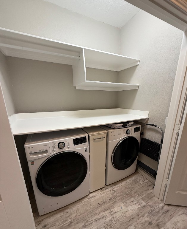 305 Rusk Bluff Avenue Leander, TX 78641 - Photo 27 of 34 a utility room with dryer and washer