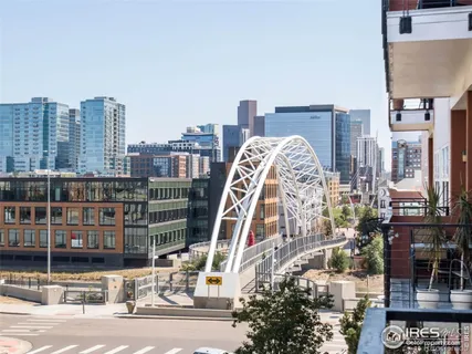 a view of a city with tall buildings