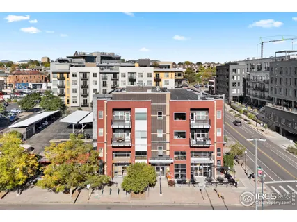 a view of a city with tall buildings