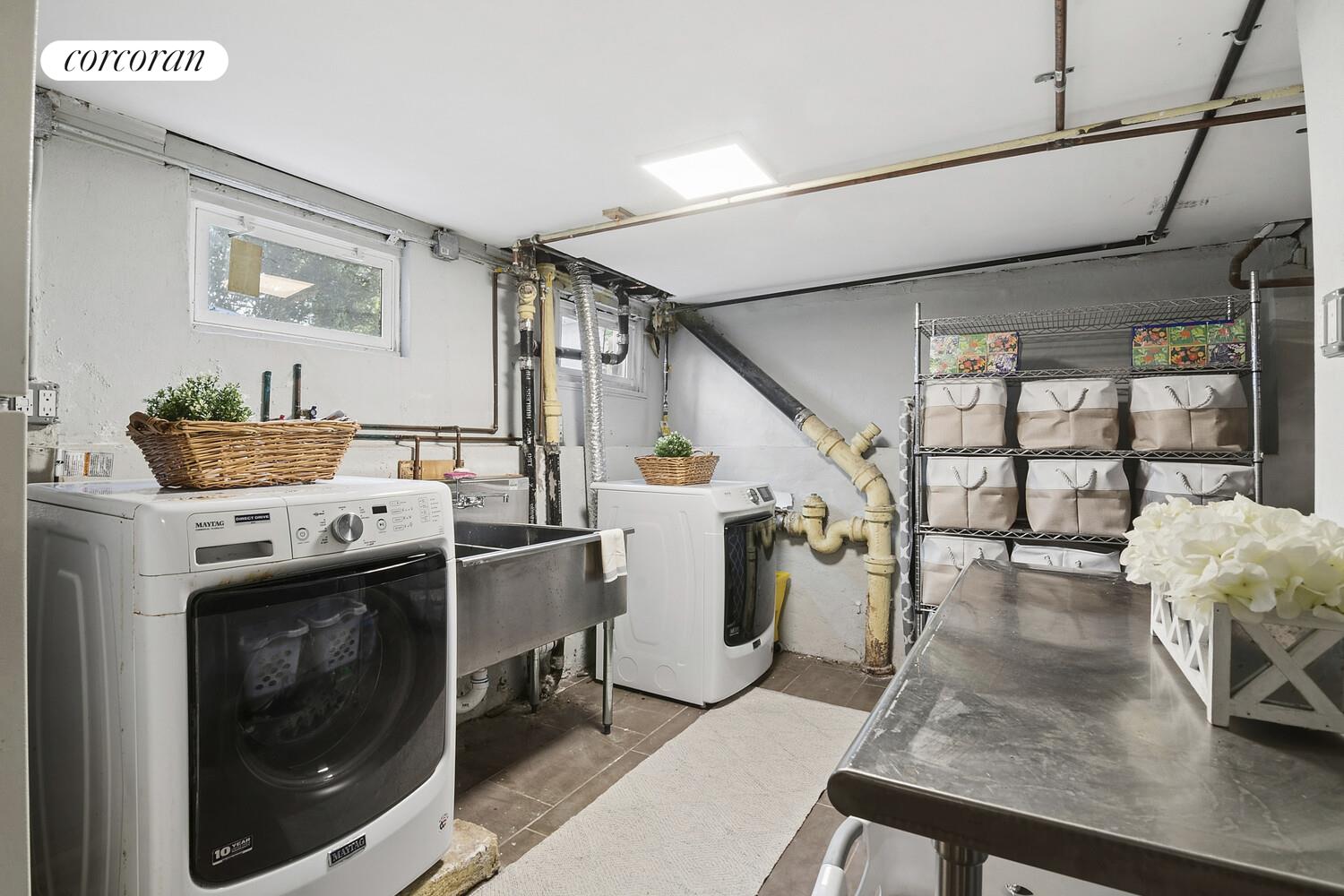 739 Argyle Road Brooklyn, NY 11230 - Photo 20 of 27 a view of a utility room with washer and dryer