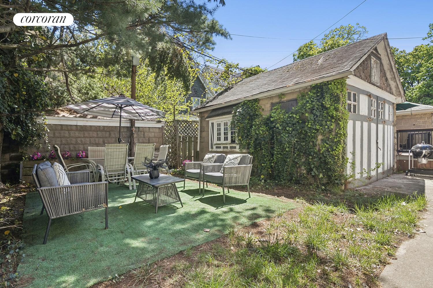 739 Argyle Road Brooklyn, NY 11230 - Photo 25 of 27 a view of a chair and table in the backyard