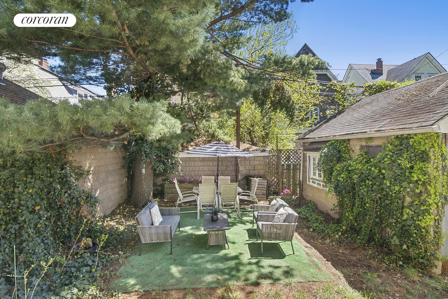 739 Argyle Road Brooklyn, NY 11230 - Photo 26 of 27 a view of a chairs and table in backyard