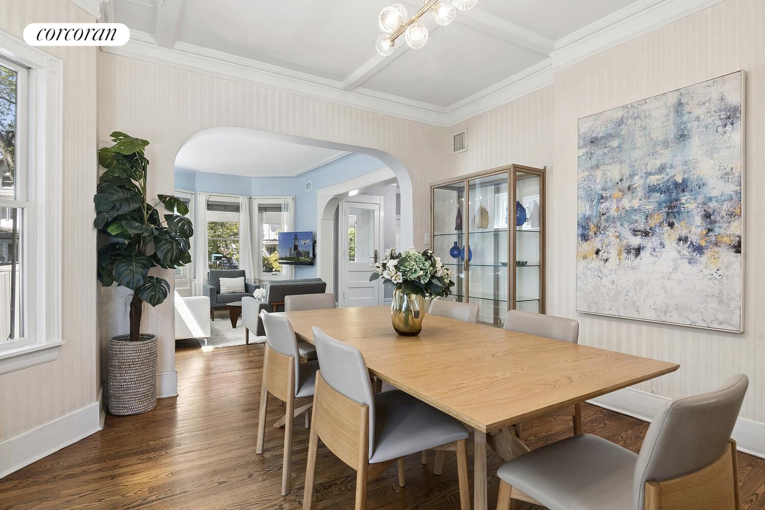 739 Argyle Road Brooklyn, NY 11230 - Photo 6 of 27 a view of a dining room with furniture and wooden floor