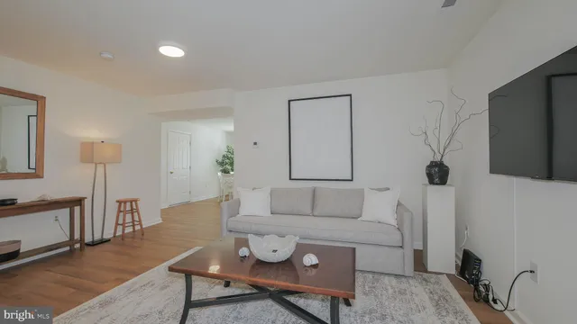 a bedroom with a bed and a mirror