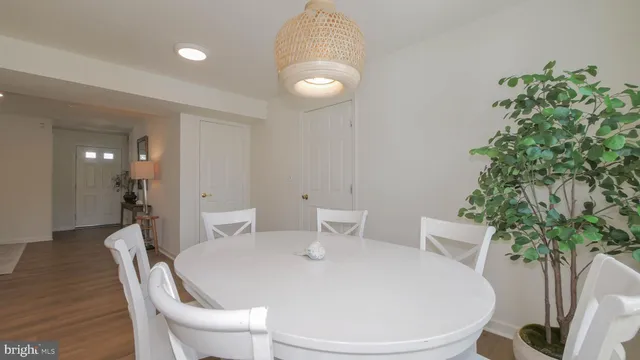 a stove top oven sitting inside of a kitchen