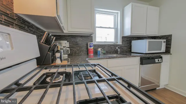 a bathroom with a toilet and a sink