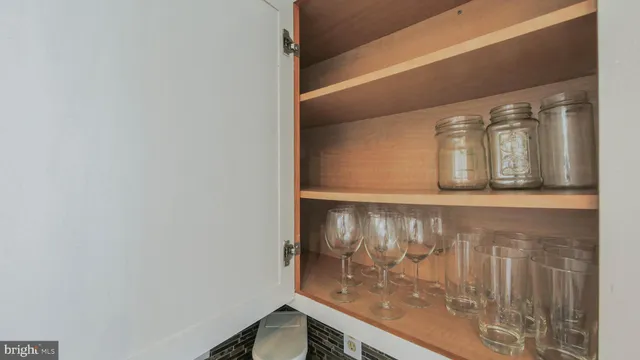 a view of a hallway with white walls