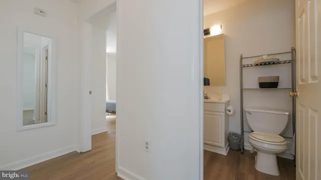 a bathroom with a shower and a mirror