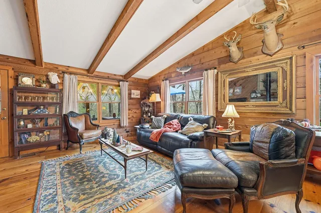 a living room with furniture or couch and a table