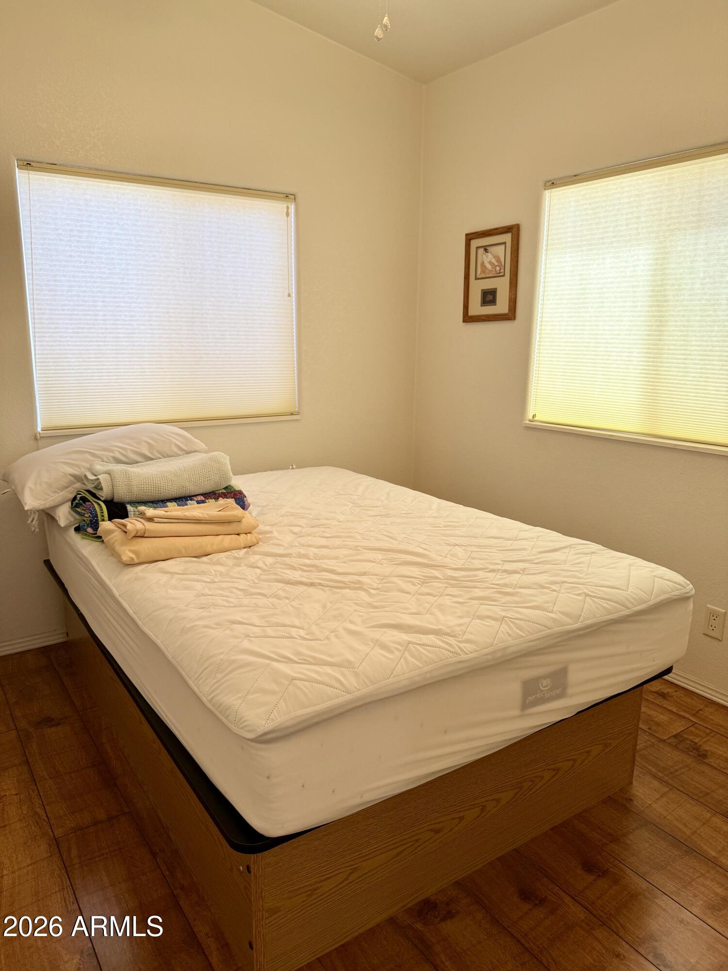 7750 East Broadway Road, Unit 197 Mesa, AZ 85208 - Photo 12 of 38 a bedroom with a bed and a window