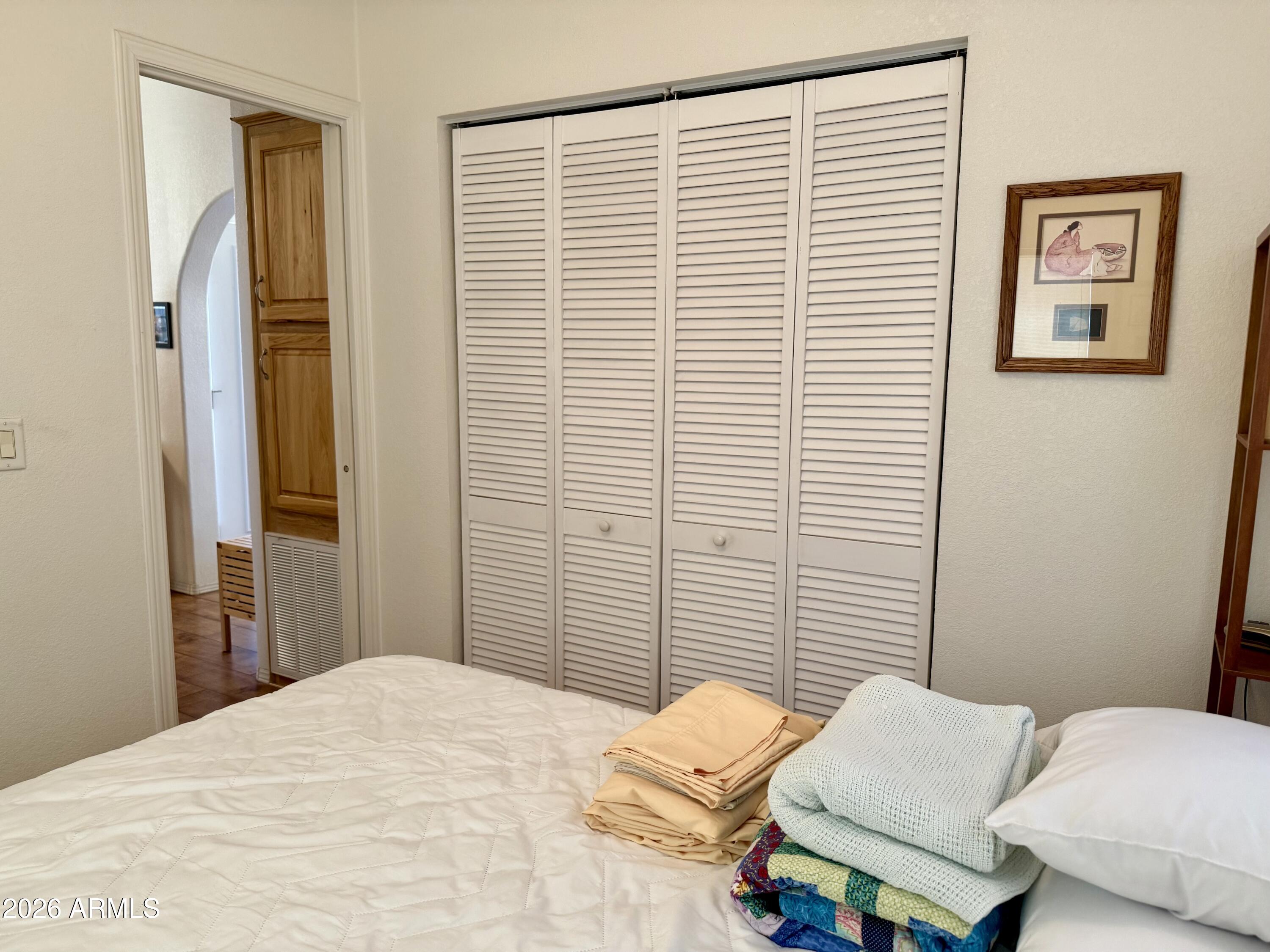 7750 East Broadway Road, Unit 197 Mesa, AZ 85208 - Photo 13 of 38 a bedroom with a bed and a window