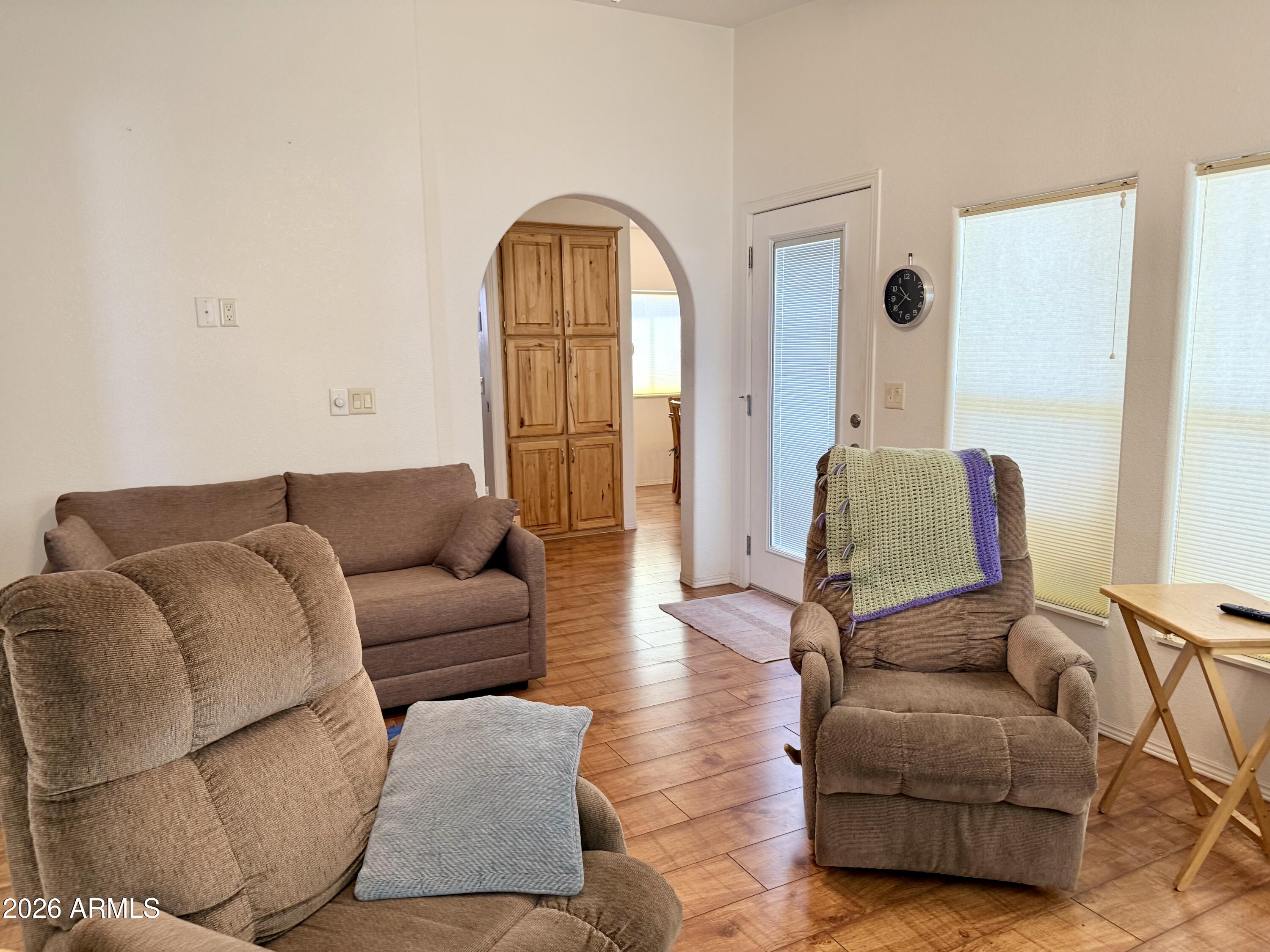 7750 East Broadway Road, Unit 197 Mesa, AZ 85208 - Photo 16 of 38 a living room with furniture and a window