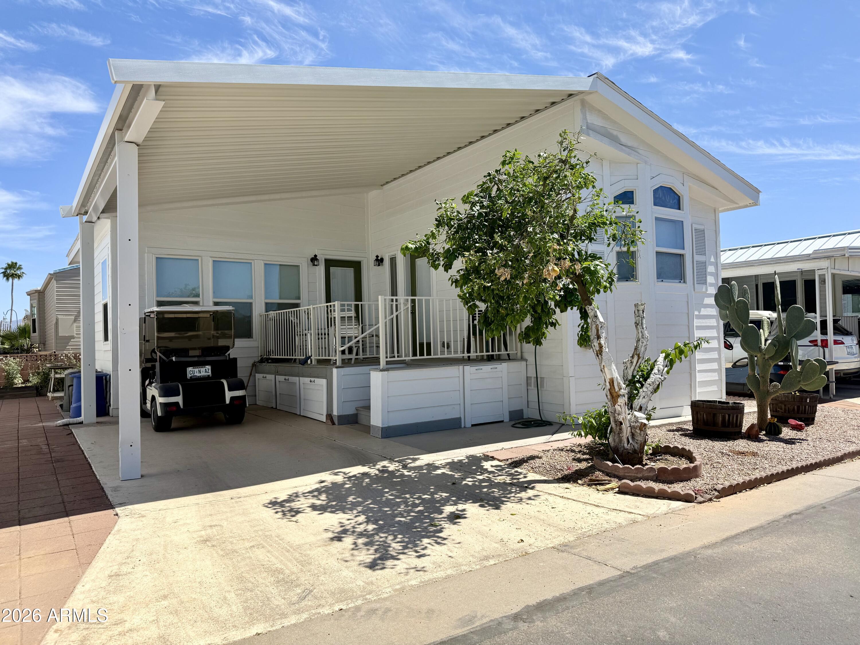 7750 East Broadway Road, Unit 197 Mesa, AZ 85208 - Photo 23 of 38 a view of a house with a patio