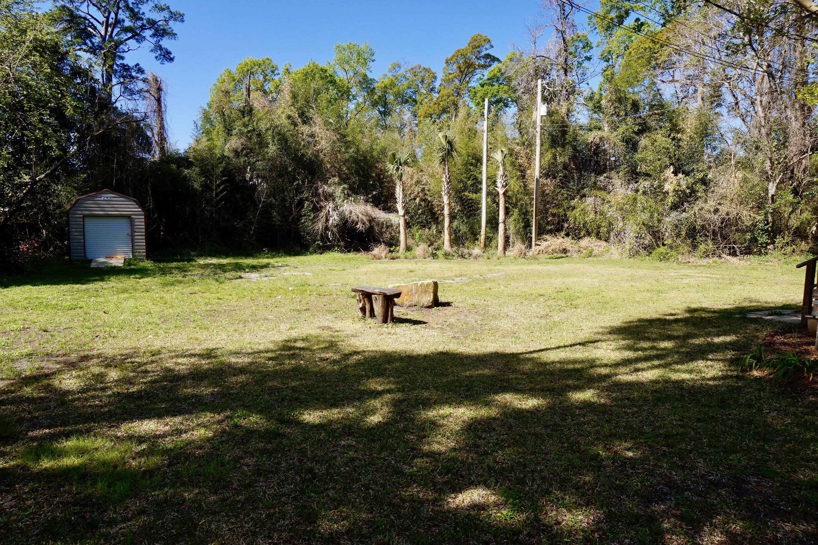 205 Tram Street Moncks Corner, SC 29461 - Photo 23 of 25 Large mature trees surround property