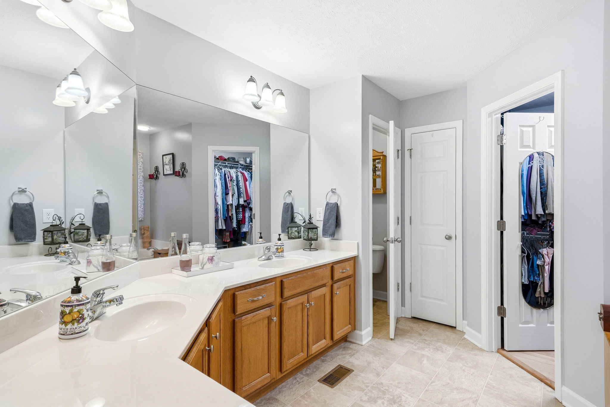 1931 Mural Lane Murfreesboro, TN 37127 - Photo 15 of 47 a bathroom with a double vanity sink and a mirror