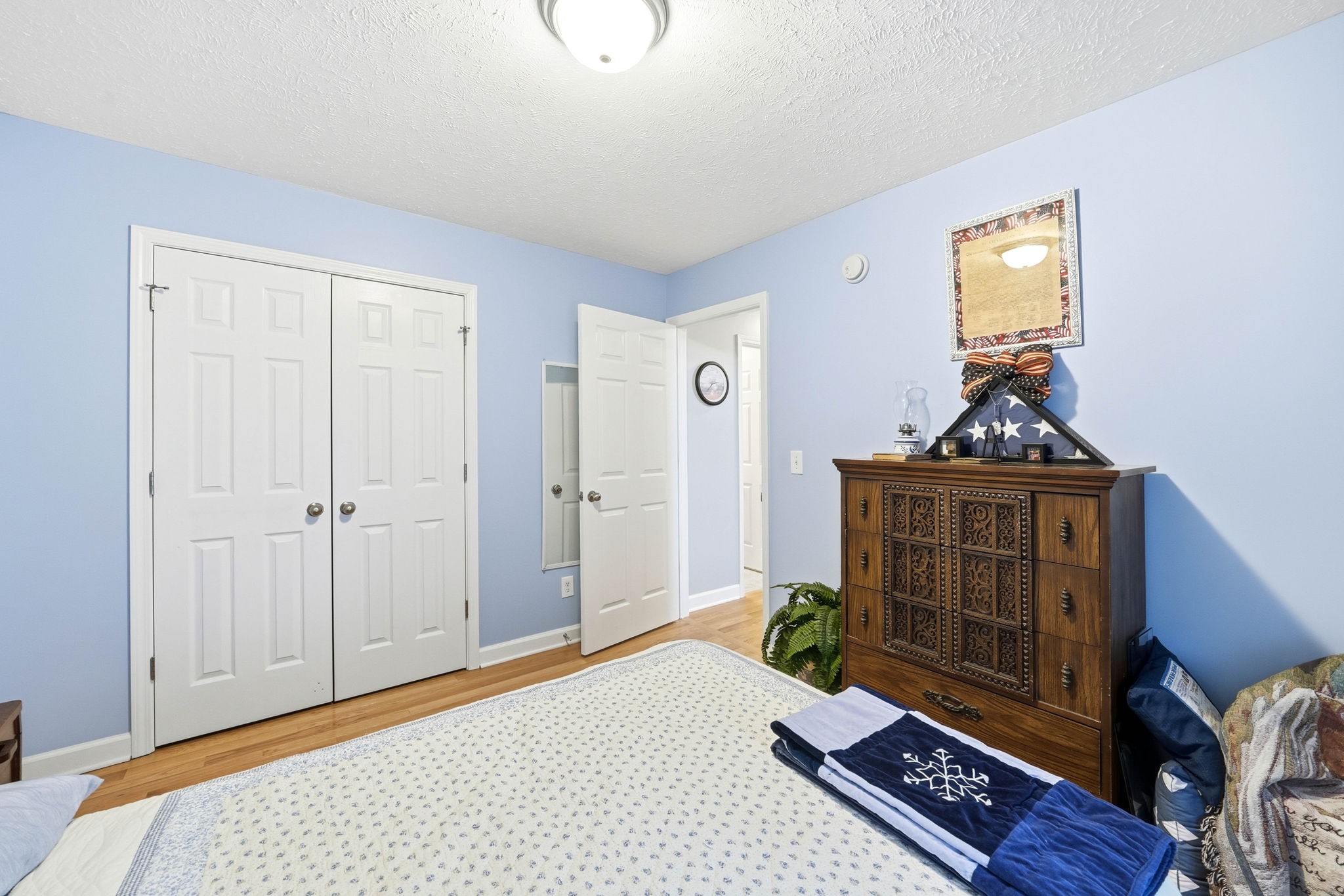 1931 Mural Lane Murfreesboro, TN 37127 - Photo 19 of 47 a bedroom with a bed and wooden floor