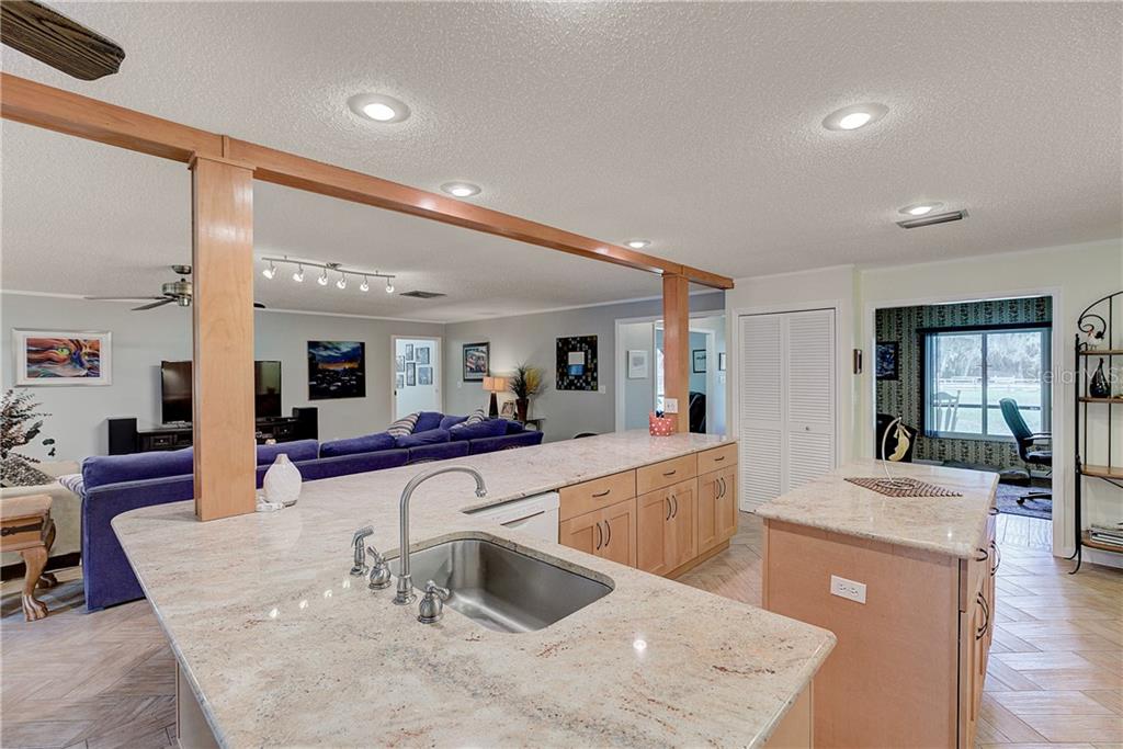 Kitchen/family room with to the right the formal dining room