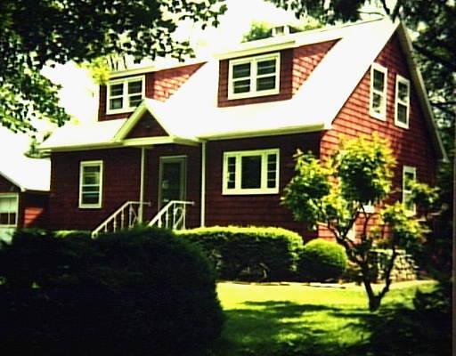29 Knollcrest Road New Fairfield, CT 06812 - Photo 1 of 1 a front view of a house with a yard