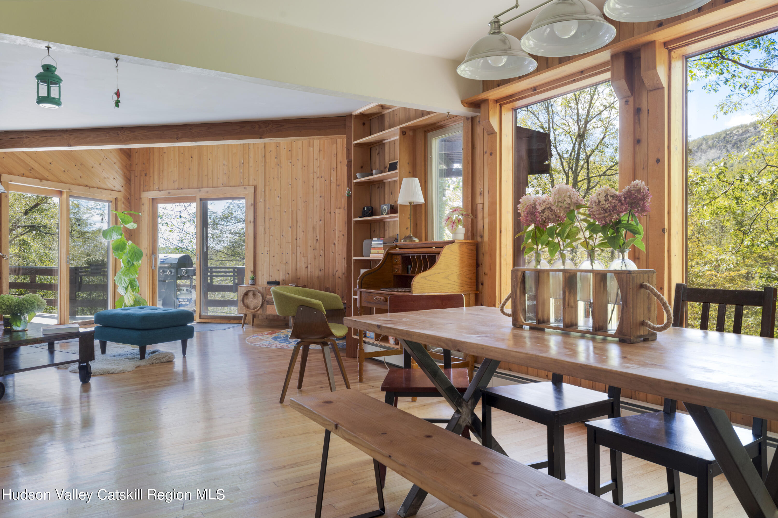 94 Sparkling Ridge Road New Paltz, NY 12561 - Photo 12 of 35 a dining room with furniture window and wooden floor