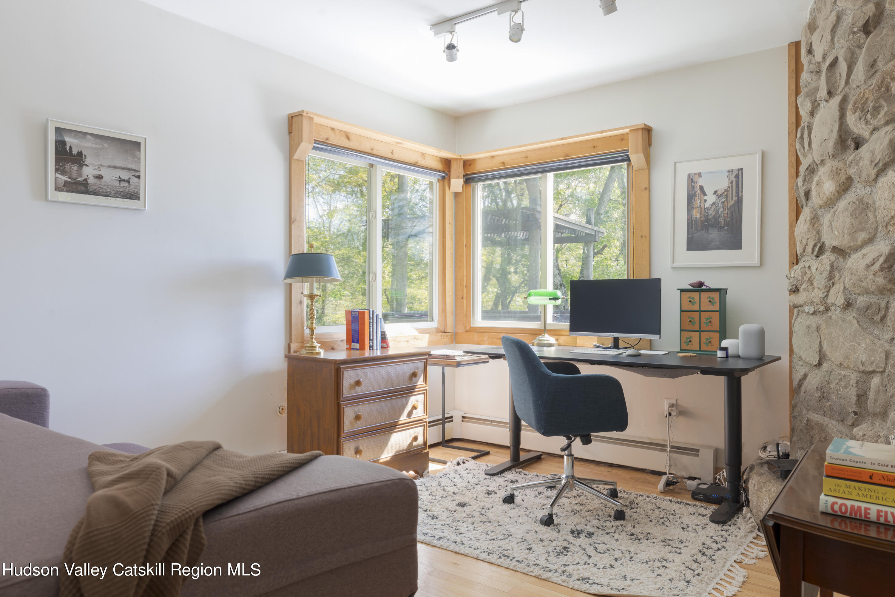 94 Sparkling Ridge Road New Paltz, NY 12561 - Photo 14 of 35 a view of a workspace with furniture and a window
