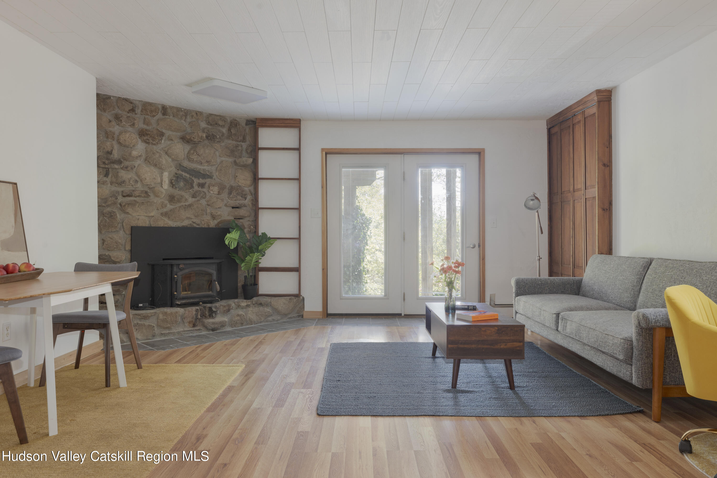 94 Sparkling Ridge Road New Paltz, NY 12561 - Photo 24 of 35 a living room with furniture and a fireplace