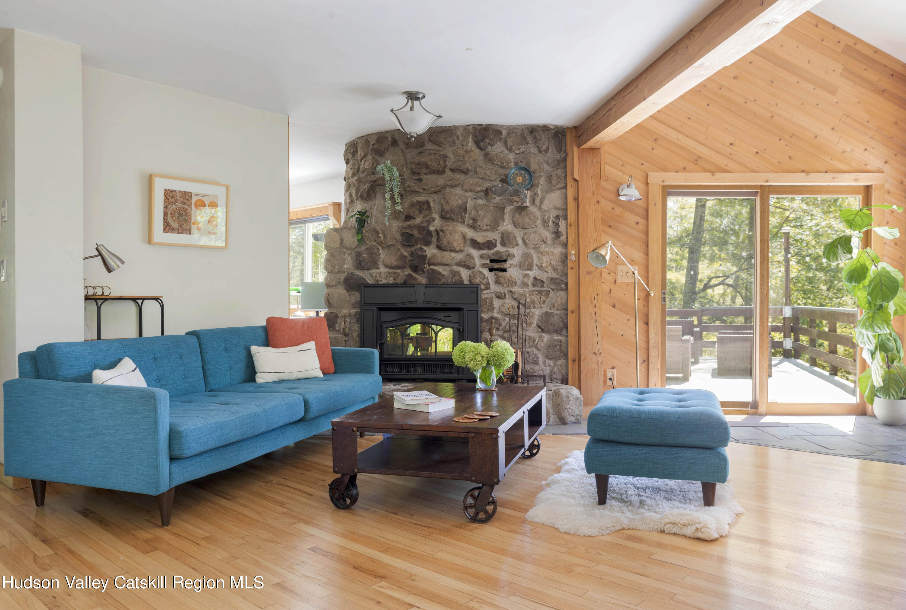 94 Sparkling Ridge Road New Paltz, NY 12561 - Photo 9 of 35 a living room with furniture and a fireplace