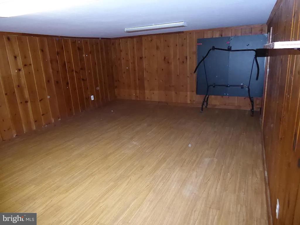 4344 Ellicott Street Northwest Washington, DC 20016 - Photo 19 of 25 a view of a room with wooden walls